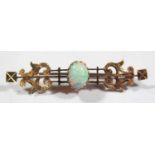 A 15ct Gold and White Opal Brooch by H. Newman, 47mm, 3g