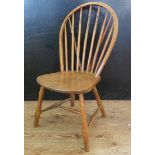 A Child's Elm Seated Spindle Back Chair