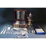 An Oak Cased Set of Six Electroplated Silver Fish Eaters, coffee pot, other flatware, two toast