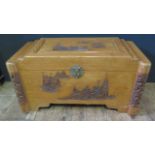 A Carved Camphor Wood Chest with slide