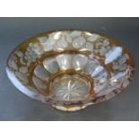 A Nineteenth Century Amber Overlay Cut Glass Bowl with slice cut and fruiting foliate decoration,