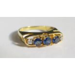 A 14K Yellow Gold, Sapphire and Diamond Five Stone Ring, size N, 3.4g