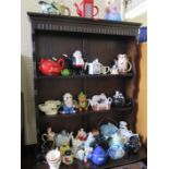 A Collection of Novelty Teapots etc.
