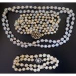 A Pearl Necklace with 9ct Gold Clasp with alternating South Sea pearls (100cm), one other with