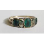 A Georgian Foil Backed Emerald and Diamond Ring in an unmarked gold setting, size L, 3.4g