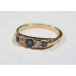 A Sapphire and Diamond Five Stone Ring in an unmarked high carat yellow gold setting, size P, 3.3g