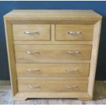 An Oak Furnitureland Bevel Chest of Drawers _ six months old (costs £334.99)