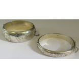 Two Chester Silver Hinged Bangles with chased foliate decoration, larger 1958 S&E, smaller 1955 S&E,