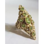 A 1970's 9ct Gold and Peridot Marquis Ring, 45mm long, size T.5, 12.7g