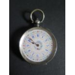 A .800 Silver Ladies Fob Watch with a pretty enamel dial, 8 jewel cylinder escapement, running