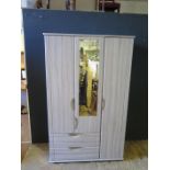 A Modern Wood Effect Compactum Wardrobe