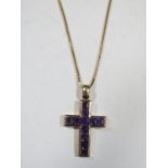 A 9ct Gold and Amethyst Set Cross Pendant (31mm long) and 9ct gold chain, 5g