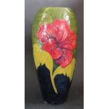 A W. Moorcroft Hibiscus Decorated Green Ground Vase, 31cm