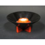 A Clarice Cliff Yoyo Black and Red Conical Candlestick, 1930/31
