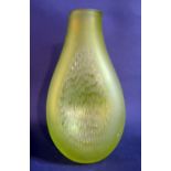 A Dartington Studio Glass Fossae Punched Vase in fluorescent lime, 38.5cm