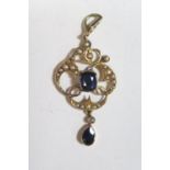 A Sapphire and Seed Pearl Pendant in a 15ct Yellow Gold Setting, 44mm drop, largest stone c.