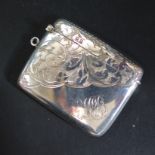 A George V Silver Vesta Case with chased foliate decoration, Birmingham 1919, W J Myatt & Co., 30.2g