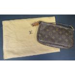 A Louis Vuitton Clutch Bag