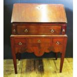 A Diminutive Mahogany Bureau