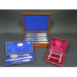 A Cased Three Piece Christening Set with mother of pearl handles, Walker & Hall, A Cased Pair of