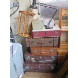 A Collection of Suitcases, two vanity cases, angle poise lamp and magazine rack