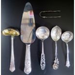 A Swedish Silver Sauce Ladle, two spoons and sugar tongs (118g), Sheffield silver sugar sifting