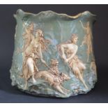 A Marbled Green Ceramic Jardinière decorated with a high relief scene of Artemis with a variety of