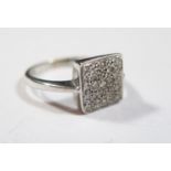 A 9ct White Gold and Diamond Square Head Cluster Ring, size P.5, 3.7g