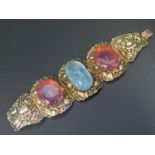 A Chinese Silver Gilt Bracelet set with rose quartz and blue stone, 16.8cm