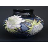 A Modern Moorcroft Collector's Club Chrysanthemum Decorated Squat Vase by Anji Davenport 2001, no.