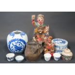 A Collection of Chinese Oddments including painted wooden figures, receipt indicating Tibetan copper