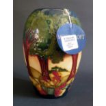 A Modern Moorcroft Trial Vase decorated with wooded filed and river landscape by Emma Bossons 6.11.