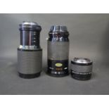A Kiron 28-210mm f/4-5.6 Camera Lens, A Vivitar 75-205mm 1:3.8 Camera Lens and A Vivitar MC 75-205mm
