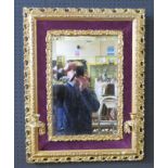 A Gilt and Plush Framed Girandole Mirror