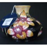 A Modern Moorcroft Connoisseur Collection Floral Decorated Squat Vase June 2004, 10.5cm, cost £221