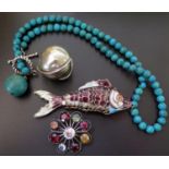 A Chiming White Metal Ball Pendant, articulated enamel fish pendant (c. 77mm long), etc.