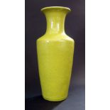 A Chinese Imperial Yellow Crackle Glazed Porcelain Vase, 18.5cm high and on turned wooden base