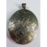 A Sterling Silver Locket Pendant with chased foliate decoration, 66mm drop, Birmingham 1973, F BROS