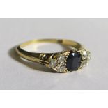 An 18ct Yellow Gold, Sapphire and Diamond Ring, size K.5, 2.5g