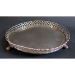 A Portugese Silver Tray with pierced gallery and standing on three paw feet, 19cm diam., 230g