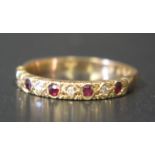 An 18ct Yellow Gold, Ruby and Diamond Half eternity Ring, size O.5, 3.1g