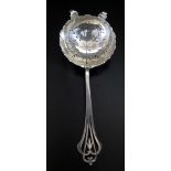 A George VI Silver Tea Strainer with pierced harebell decorated handle, Birmingham 1949, Barker