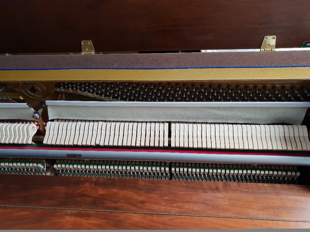 Welmar (c1994) An upright piano in a modern style mahogany case. AMENDMENT Is in a walnut case. - Image 4 of 4