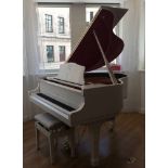 Kawai AMENDMENT Is a Ritter 4ft 8in grand piano.