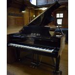 Kawai (c1976) A 7ft 4in Model KG-6C grand piano in a bright ebonised case on square tapered legs.