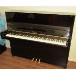 Petrof (c2011) A Model P118 upright piano in a modern style bright ebonised case.
