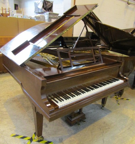 Blüthner (c1919) A 6ft 3in grand piano in a rosewood case on square tapered legs.