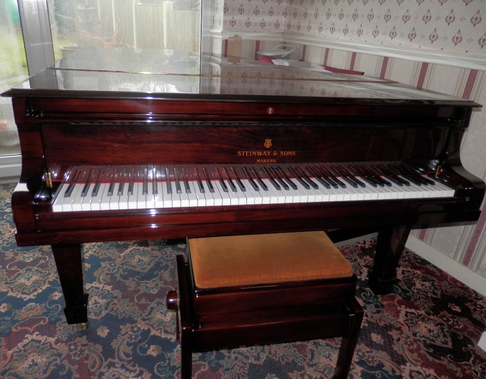 Steinway (c1914) A 5ft 10in Model O grand piano in a bright rosewood case on square tapered legs.