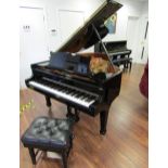 Steinway (c2001) A 5ft 10in Model O grand piano in a bright ebonised case on square tapered legs;