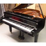 Yamaha (c1977) A 4ft 11in Model GB1grand piano in a bright ebonised case on square tapered legs.